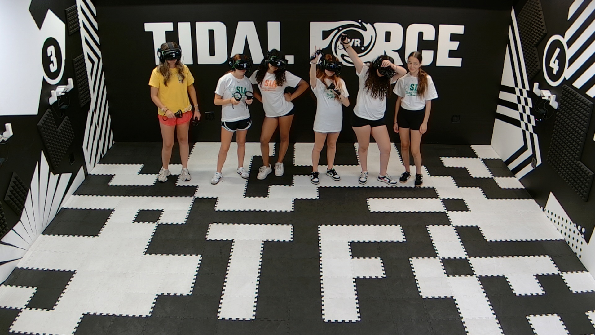 Campers celebrating after a Tidal Force VR session.