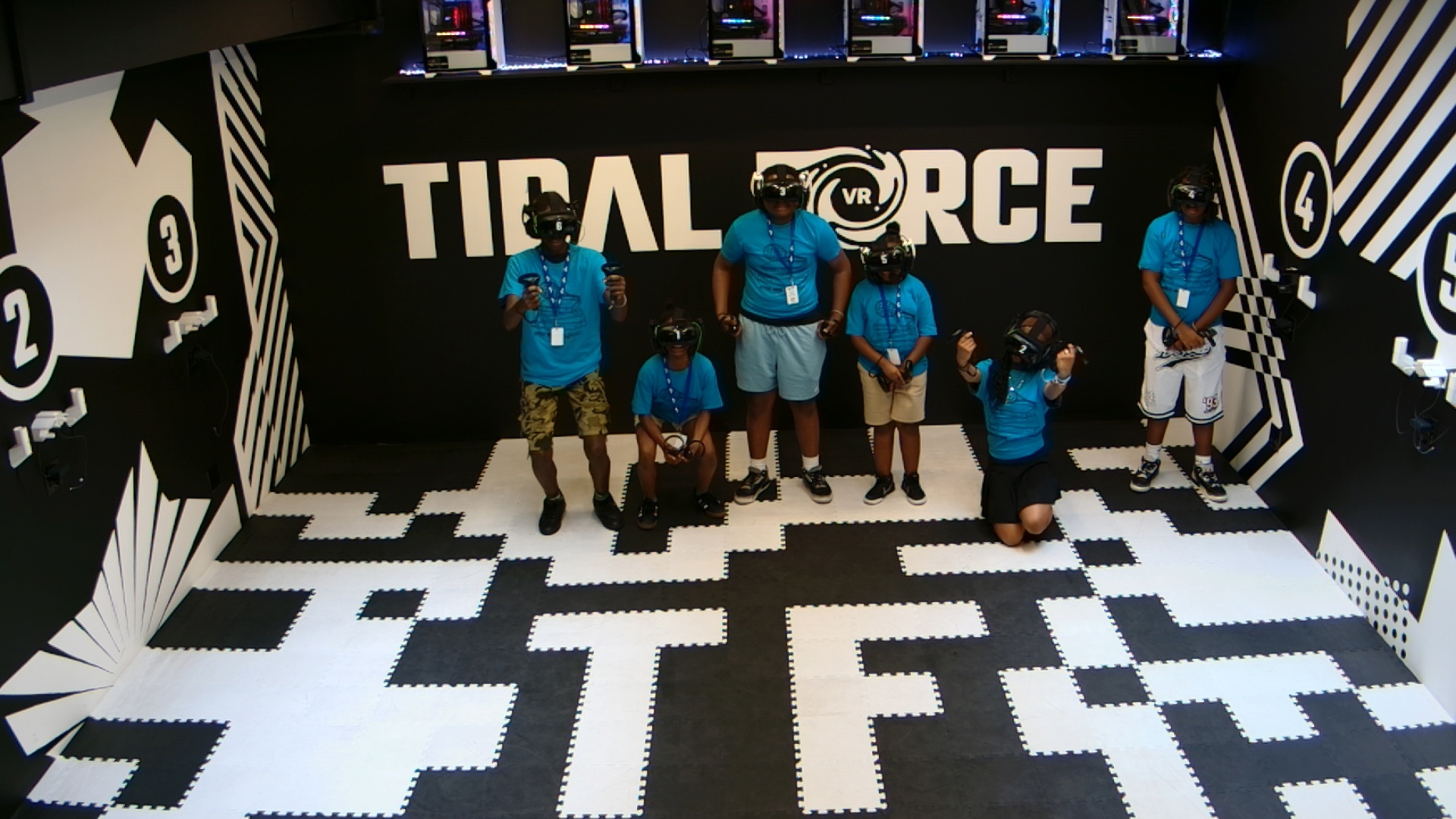 Campers celebrating after a Tidal Force VR session.